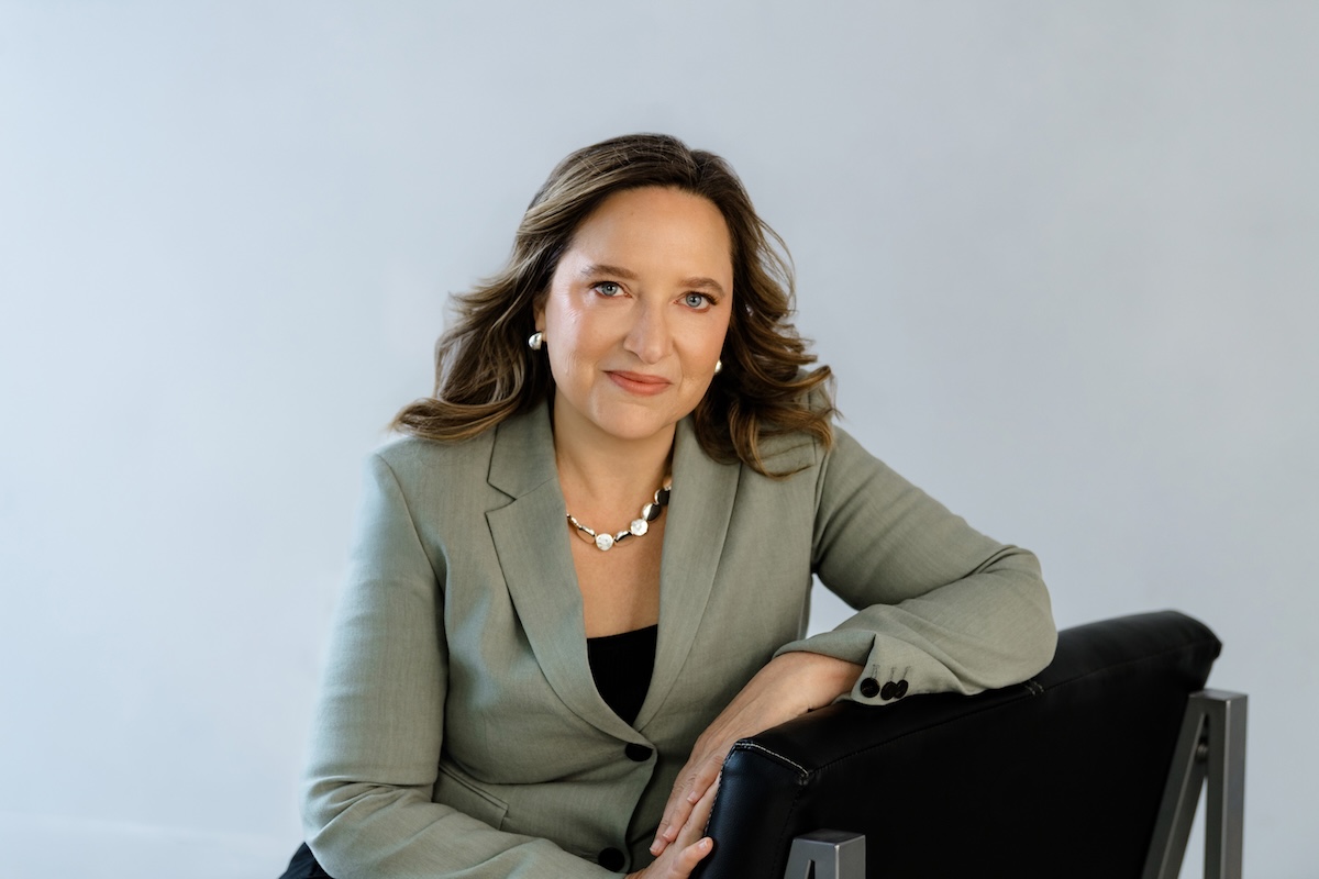 Stacy Monahan Tucker Selected to 2026 Washington Super Lawyers List for Insurance Coverage & Employee Benefits Portrait of Stacy Monahan Tucker, ERISA lawyer and founder of Monahan Tucker Law, seated in a gray blazer